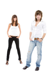 Studio view of a young, casual, sexy couple