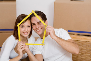 happy couple in first home