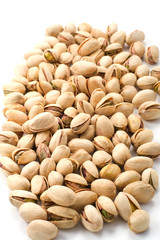 Pistachios on the white background