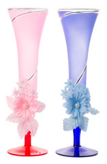 close-up red and blue wedding flutes, isolated on white