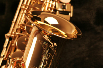 picture of a beautiful golden saxophone - obrazy, fototapety, plakaty