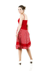 Rear view of a beautiful woman with a red dress
