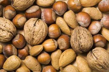 background of walnuts, almonds and hazelnuts