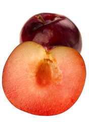 Detail plum with slice on white background