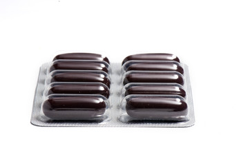 packs of vitamins on the white isolated background