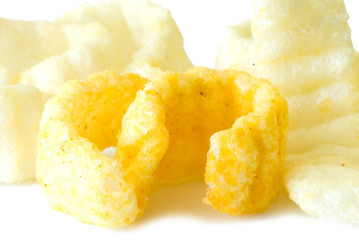 crisp potato chips on a light background