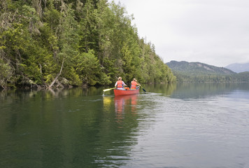 Girl and boy canoeing, Canada
