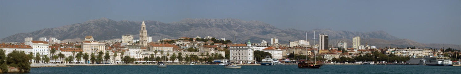Split waterfront with the moutains in the background.