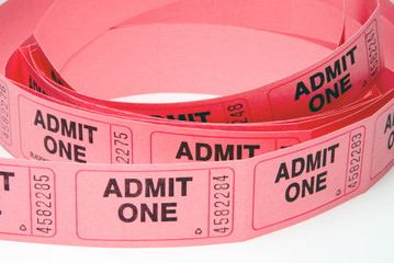 A small roll of retail admission tickets.