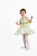 Girl with flowers jumping and laughing