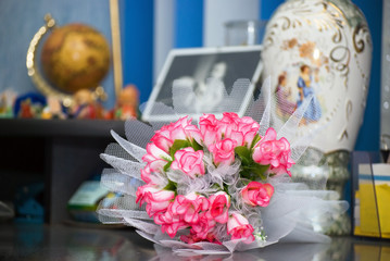 Wedding bouquet on a table in a children's room