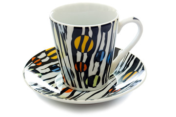 close-up of colorfull dish and cup for coffee, isolated on white