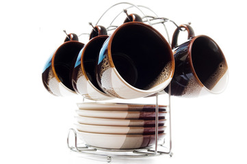 Set of six teacups and dishes, different ungle, selective focus