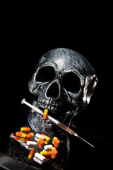 Skull and Pills on Black Background