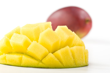 Fresh,  juicy, appetizing mango on a white background
