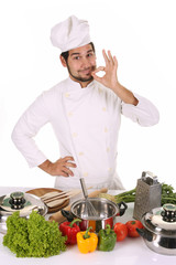 young chef preparing lunch on white background