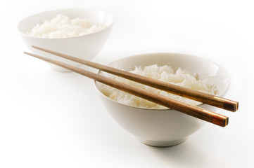 two bowls of plain rice  isolated on on white