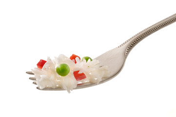 rice with pea and pepper on fork isolated on white
