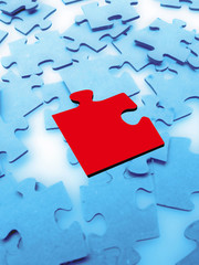 Jigsaw puzzle pieces on blue background