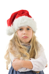 einen kleines mädchen mit weihnachtsmütze eingeschnappt