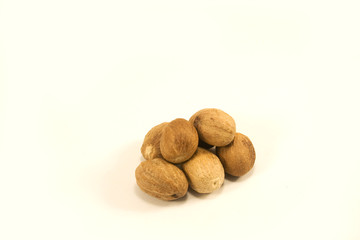 Nutmeg isolated on white