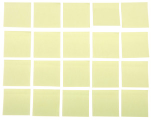 Fototapeta premium Yellow post it notes on a white background,