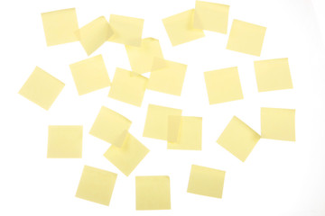 Yellow post it notes on a white background,