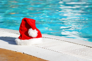 Santa hat near the swimming pool