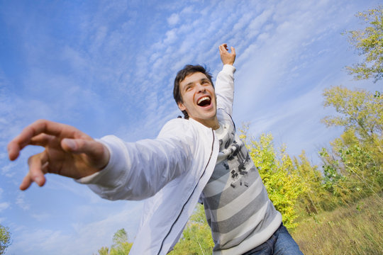 Happy Young Man - Flies In Blue Sky