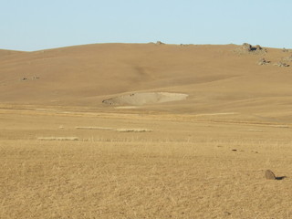 Naklejka na ściany i meble Impact crater in Mongolia