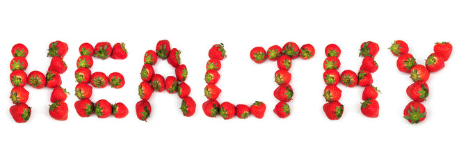 healthy spelled out in strawberries