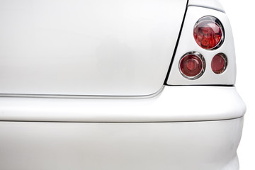 Rear red lights on plain white car. Styling and tuning concept
