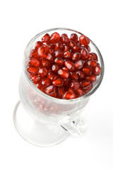 Fresh grains of a pomegranate in a glass