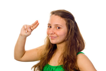 Beautiful girl wearing a green dress saluting to the camera