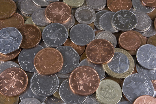 A pile of random used UK coinage