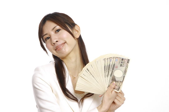 young woman holding money