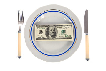 dollars on food plate with fork and knife