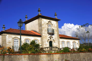 Fototapeta premium Portugal view of a typical white house