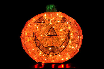 Jack-O-Lantern Lit Up on Black Background