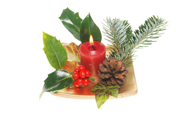 Christmas table decoration with burning candle