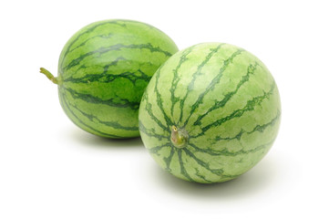 Two fresh watermelons isolated on white background