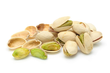 Heap of pistachios nuts in isolated white background