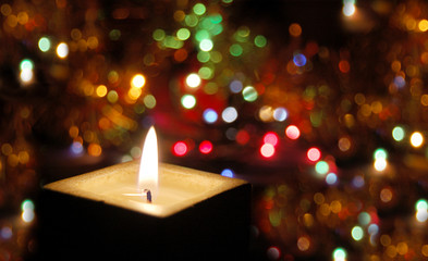 candle lit with colorful background