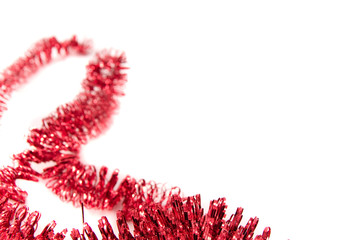 Christmas tinsel on white background