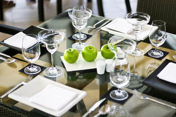 elegant table setting with apples.