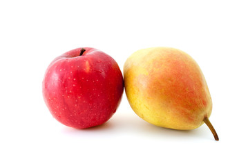 Red apple and yellow pear isolated on the white background