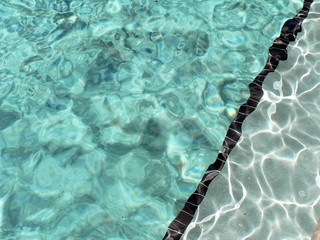 close up of water in a outdoor pool at a resort