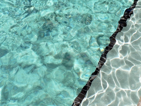 close up of water in a outdoor pool at a resort
