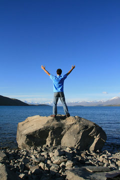 A young man embracing nature&acute;s beauty
