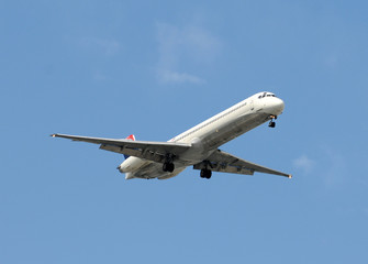 Passenger jet approaching airport for landing